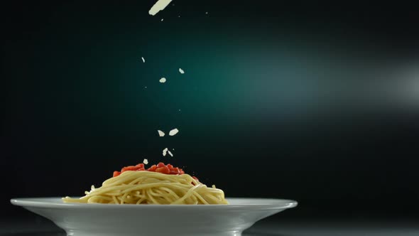 Putting parmesan chese on spaghetti, Slow Motion