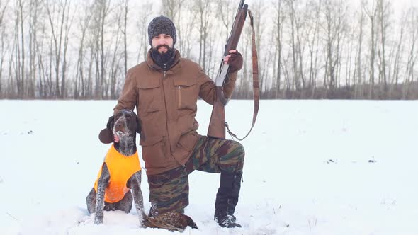 Happy Hunter with Dog and Their Game. Good Day for Hunting.