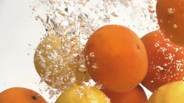 Orange And Lemon Dropping Water