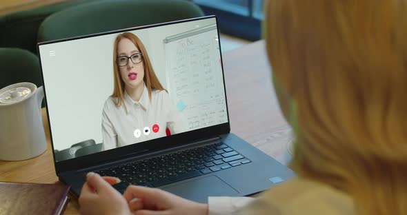 Woman Studying at Home Office Online By Conference Video Call Laptop Speak Communicates Teacher