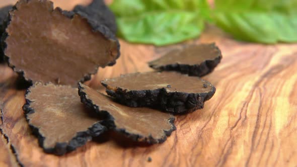 Close Up of Rare Black Truffle Cutted Into Pieces 