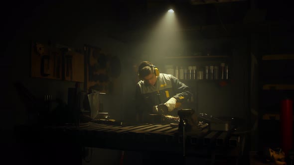 A man works with a circular saw