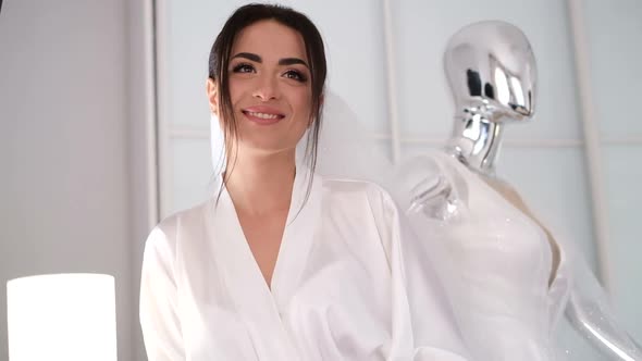 Very Beautiful Brunette Bride She Gently Looks Into the Camera Lens and Smiles