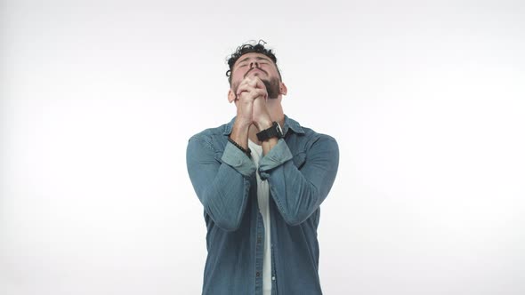 Portrait Hopeful Bearded Man Clench Hands in Begging Pose Supplicating Raise Head Up Pleading God