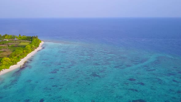 Aerial drone travel of tourist beach voyage by blue sea and sand background