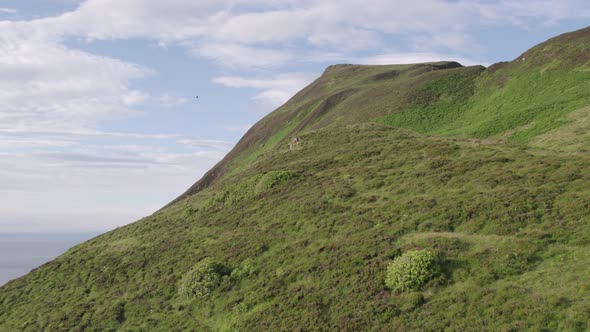 View of the Mountainous Scottish Landscape on the Holy Isle