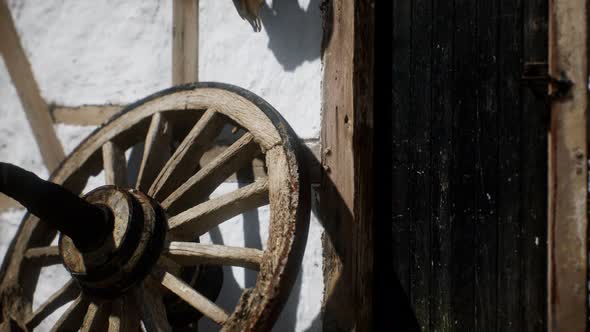 Old Wood Wheel and Black Door at White House