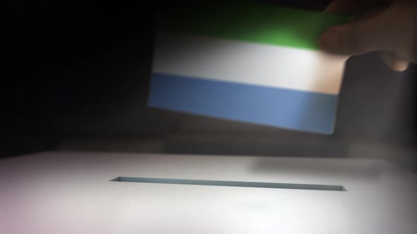 Compositing Hand Voting To Flag OF Sierra Leone