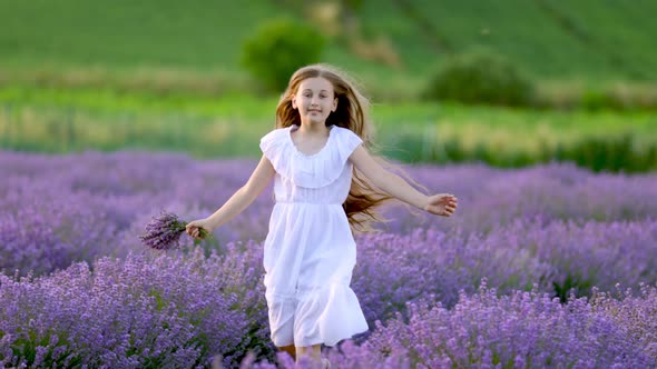 a Girl Running in a Lavender Field