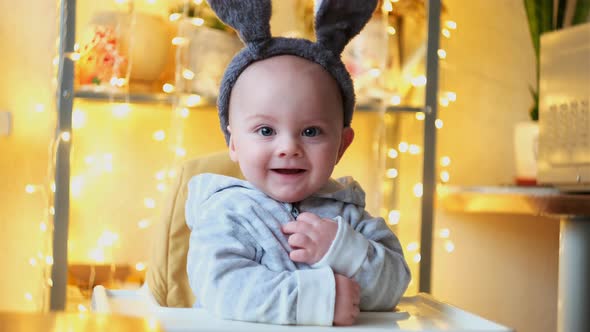 Happy Little Baby Boy with Bunny Ears