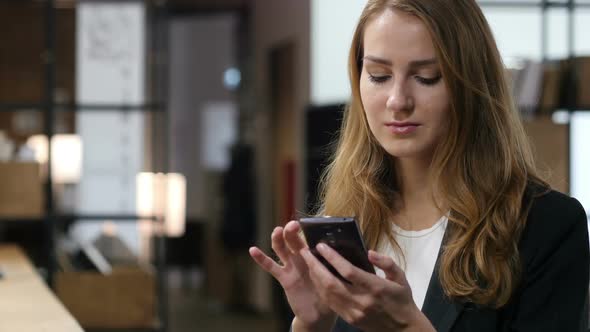 Browsing on Smartphone, Online Surfing by Young Girl