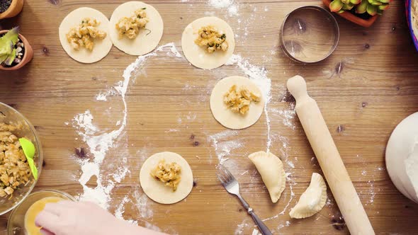 Flat lay. Step by step. Making home made empanadas with chicken and grilled corn.