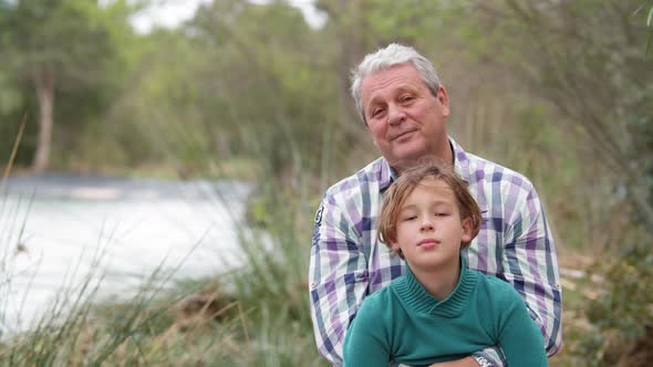 Grandchild with Grandfather in Quiet Countryside