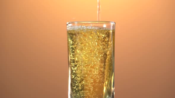 Closeup of Pouring Juice Into a Glass