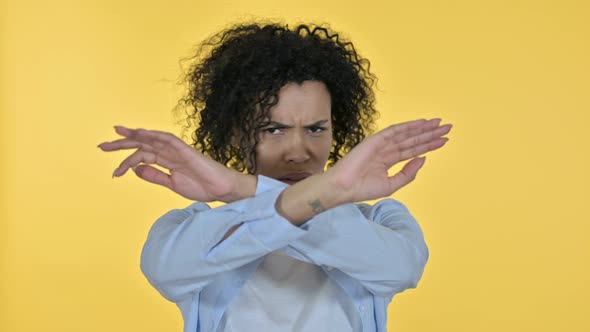 Portrait of Casual African Woman Saying No By Hand Gesture