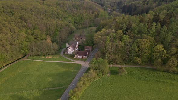 circular drone flight over the vast meadows and a huge farm in the area of the German city of Wetzla