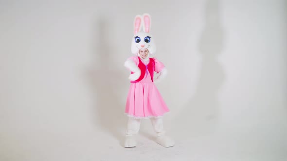 Portrait of a young cute girl in a beautiful hare costume