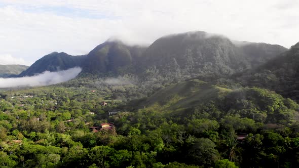Valle de Anton valley in central Panama located in extinct volcano crater with low clouds, Aerial wi