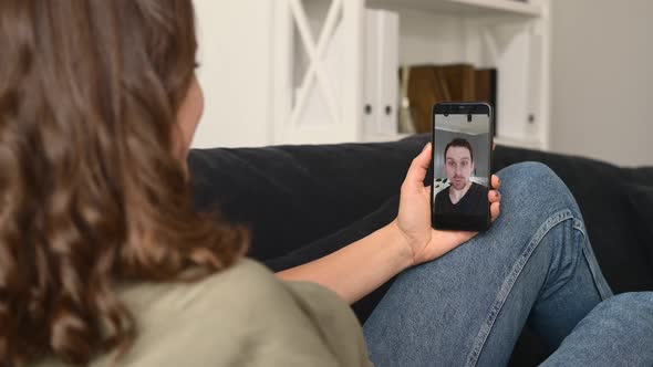 Woman Using Smartphone for Video Call