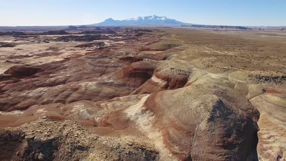 Aerial view flying backwards over the Mars desert in Utah