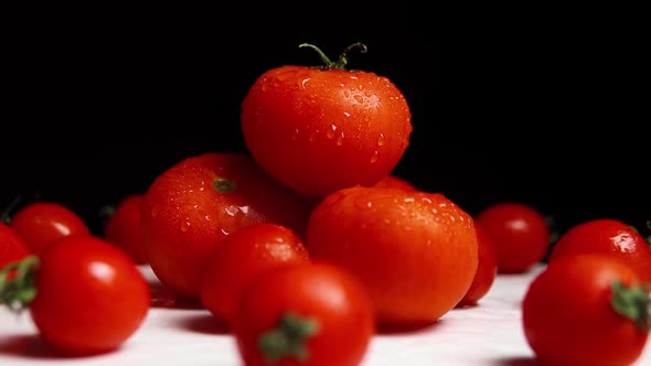 Fresh Washed Ripe Red Tomatoes on the White Surface