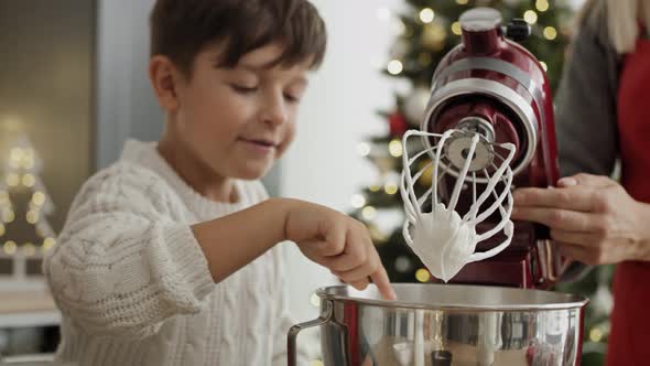 Video of children tasting sugar paste at Christmas time. Shot with RED helium camera in 8K.