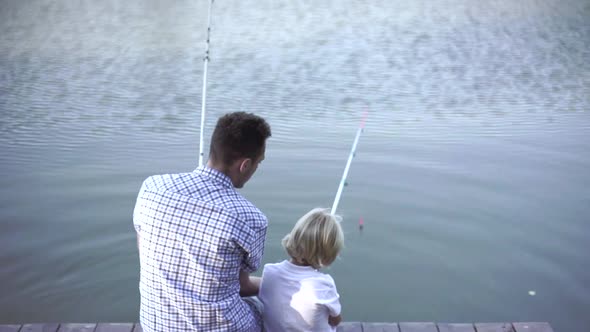 Dad and son fishing