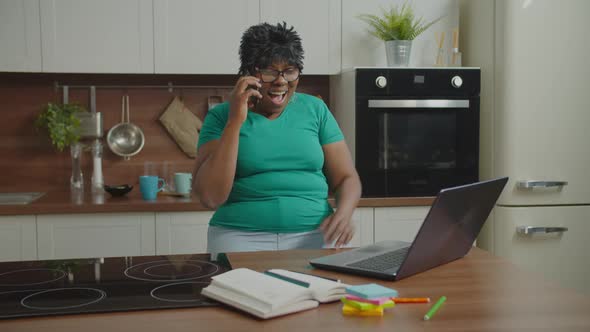 Excited Senior Freelance Woman Celebrating Success