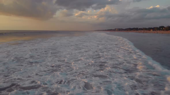 Flight at Sunset Overlooking the Indian Ocean in Bali Indonesia