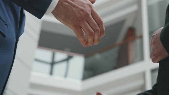 Handshake of Businessmen after Deal