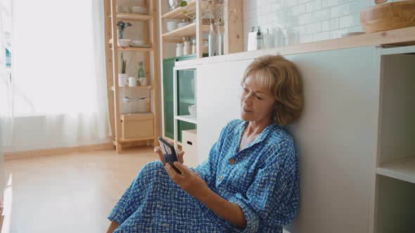 woman spending time in her cozy apartment