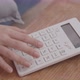 Close up shot of businesswoman or female accountant hand using a calculator - VideoHive Item for Sale