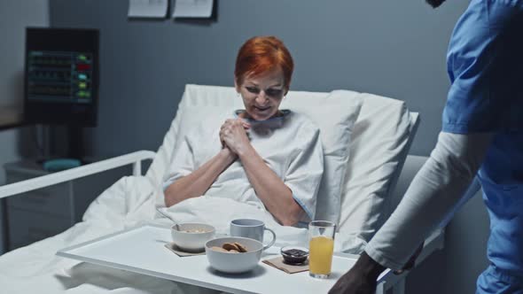 Patient Getting Breakfast in Bed