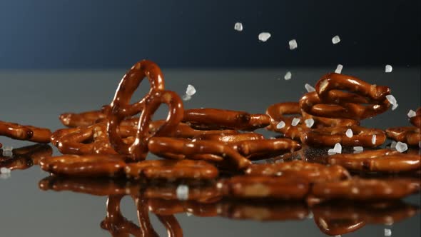 Pretzels falling and bouncing in ultra slow mo 1500fps - reflective surface - PRETZELS PHANTOM 