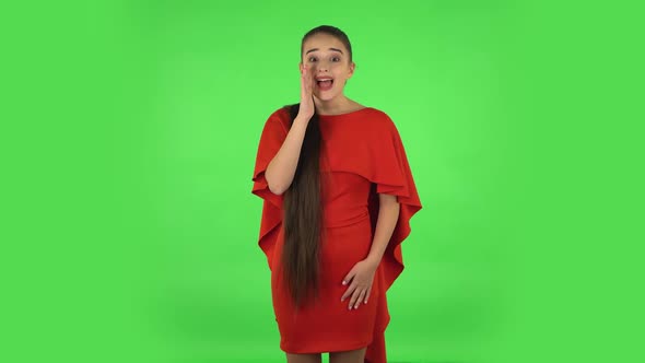 Pretty Young Woman Is Screaming Calling Someone. Green Screen