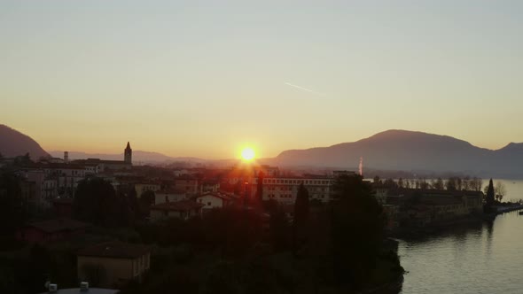 Arial shot of the sunset over Iseo Lake in Wintertime Filmed on Dji Mavic pro 2 10 bit 4:2:2