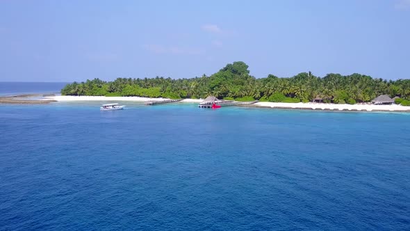 Drone aerial tourism of resort beach time by blue water with sand background