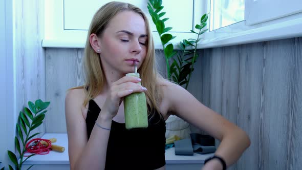 Young Millenial Blond Woman Drinking Vegan Smoothie Drink Detox