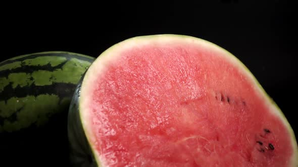 Sliced Watermelon with Red Pulpy on Black Background