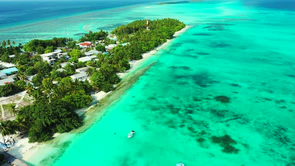 Natural overhead travel shot of a summer white paradise sand beach and blue ocean background in vibr