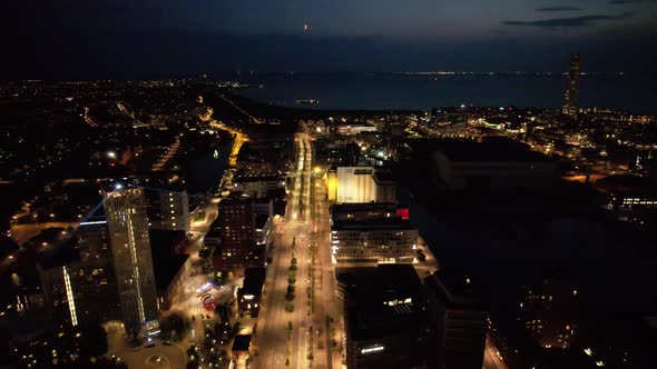 Aircraft flying backwards Malmö night. Clarion, Turning torso