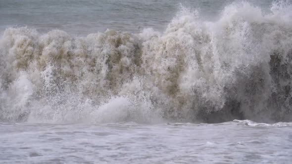 Storm on the Sea. Huge Waves Are Crashing and Spraying on the Shore