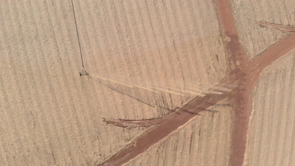 Soil treatment in sugarcane plantation. vinhoto nutritive substance , aerial view