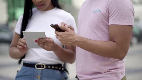 Cropped Shot of Young People Using Digital Devices