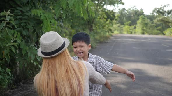 Mom hugging her son in Slow motion