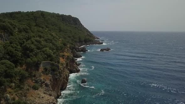 Pirate bay cove green trees blue sky ocean