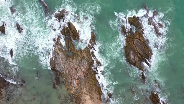 Aerial Top View Waves Hit On The Rocks At Kalim Beach Phuket