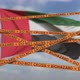 Biohazard Restriction Tape Lines Against the UAE Flag - VideoHive Item for Sale