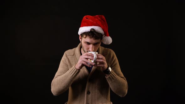 A man enjoying a cup of tea
