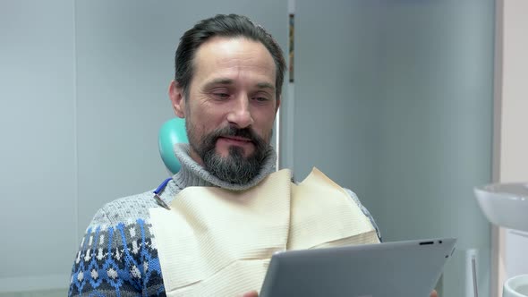 Man in Dentist Office.